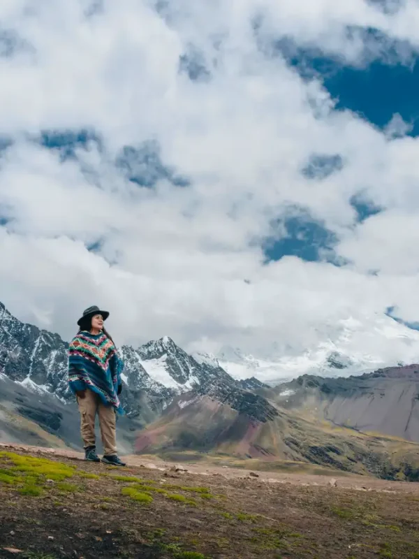 Traveler exploring high-Andean landscapes during the Ausangate Luxury Glamping Trek