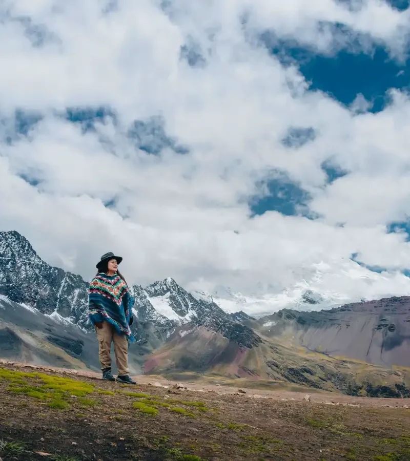 Traveler exploring high-Andean landscapes during the Ausangate Luxury Glamping Trek