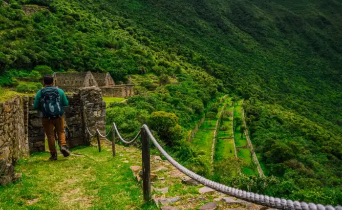 Hiker exploring the Choquequirao ruins and terraces
