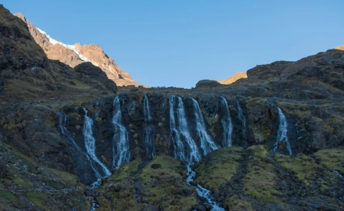 Luxury Lares Trek 4 Days through remote Andean landscapes with cascading mountain waterfalls