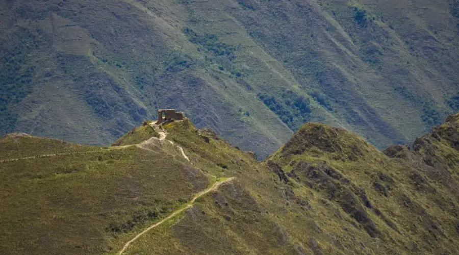 Ancient Inca ruins at Moonstone Quarry along a mountain trail in the Andes