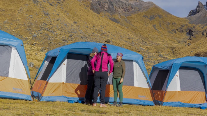 Scenic mountain trail surrounded by lush landscapes in the Peruvian Andes