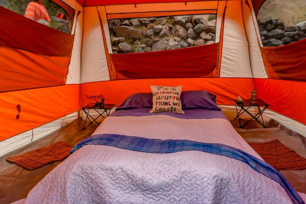 Comfortable Beds in Luxury Camping Comfortable bed and bedding inside a luxury camping tent