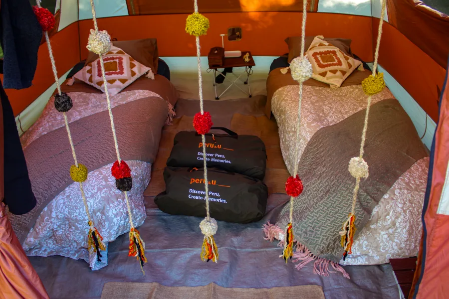 Luxury Camping Accommodation in the Andes Comfortable beds inside a luxury camping tent in the Andes