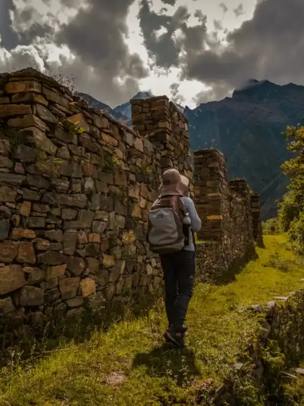 Traveler exploring ancient Inca walls during the Luxury Choquequirao Trek 5 Days
