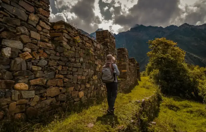 Traveler exploring ancient Inca walls during the Luxury Choquequirao Trek 5 Days