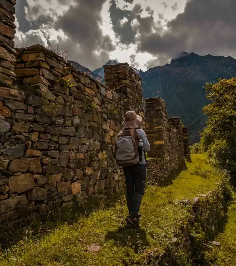 Traveler exploring ancient Inca walls during the Luxury Choquequirao Trek 5 Days
