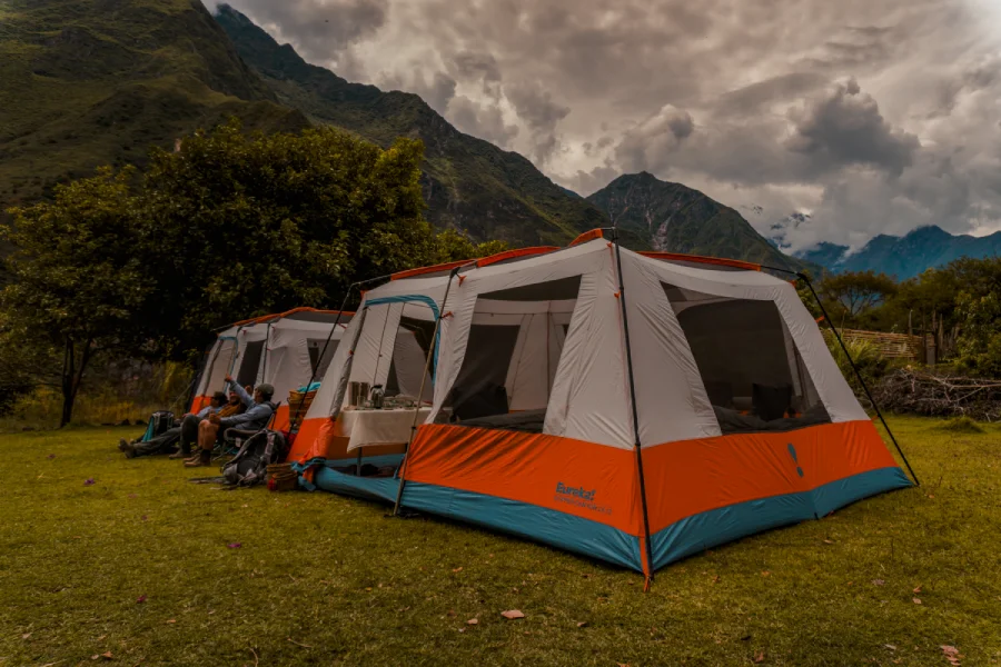Comfortable glamping tents surrounded by lush Andean mountains in Peru