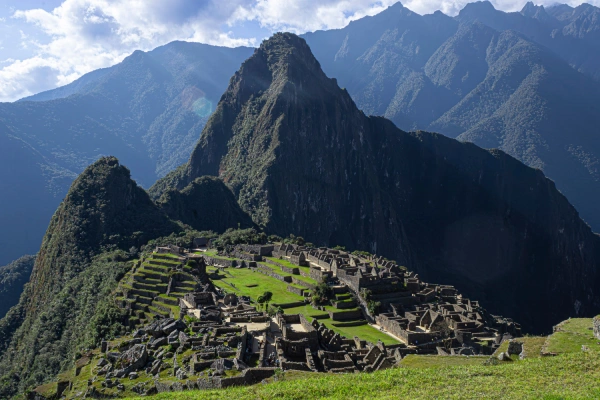Panoramic view of the ancient Machu Picchu citadel surrounded by the Peruvian Andes