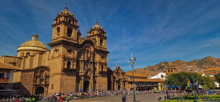 plaza de armas cusco cultural procession Traditional performers crossing Cusco's Plaza de Armas